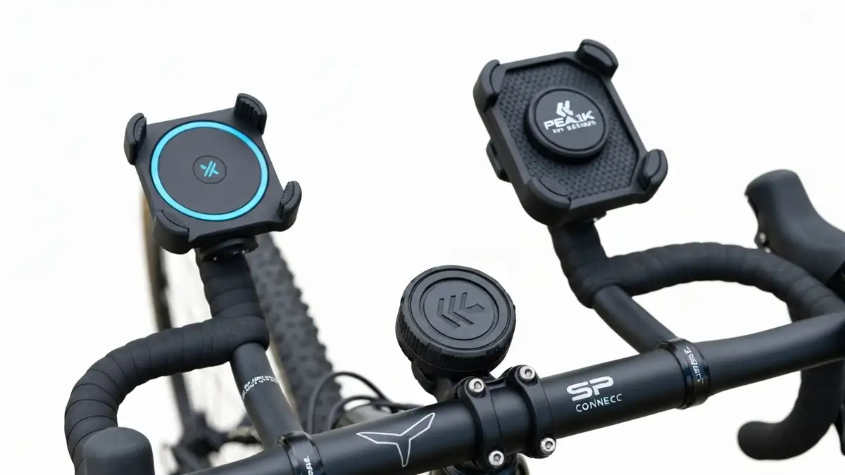 Porównanie trzech uchwytów na telefon: Quad Lock, Peak Design i SP Connect zamontowanych na kierownicy rowerów szosa i MTB